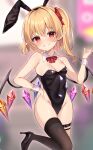  1girl alternate_costume animal_ears armpit_crease bare_shoulders between_fingers black_leotard black_thighhighs blonde_hair blurry blurry_background blush breasts commentary_request crystal earrings eyes_visible_through_hair fake_animal_ears flandre_scarlet foot_out_of_frame grin hair_between_eyes hand_up high_heels highres holding jewelry leotard looking_at_viewer miy@ one_side_up petite playboy_bunny pointy_ears rabbit_ears red_eyes short_hair simple_background small_breasts smile solo standing standing_on_one_leg thighhighs touhou wings wrist_cuffs 