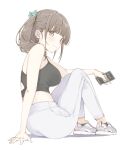  1girl black_shirt breasts brown_eyes brown_hair cellphone highres large_breasts maigoyaki medium_hair original pants phone shirt side_ponytail sitting smartphone solo spaghetti_strap sportswear white_footwear white_pants yoga_pants 