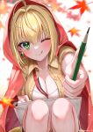  1girl ;p absurdres ahoge between_breasts blonde_hair blush breasts cargo_shorts cleavage cloak earrings falling_leaves fate/extra fate/grand_order fate_(series) green_eyes hair_intakes highres jacket jewelry large_breasts leaf looking_at_viewer nero_claudius_(fate) nero_claudius_(fate/extra) one_eye_closed pencil red_ribbon ribbon shorts sketchbook smile solo squatting strap_between_breasts tongue tongue_out yayoi_maka 