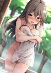  1girl akahi242 blurry blurry_background blush breasts brown_eyes brown_hair collarbone covering covering_breasts embarrassed hair_between_eyes haruna_(kancolle) highres kantai_collection large_breasts long_hair looking_at_viewer nude_cover onsen open_mouth solo steam tree wet white_towel 