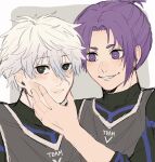  2boys black_eyes blue_lock bright_pupils closed_mouth commentary_request fuyutsuki grin hair_between_eyes hand_on_another&#039;s_face highres long_sleeves looking_at_another looking_at_viewer male_focus mikage_reo multiple_boys nagi_seishirou purple_eyes purple_hair short_hair smile soccer_uniform sportswear teeth two-tone_background upper_body white_hair white_pupils 
