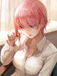  1girl blue_eyes breasts cleavage collared_shirt commentary_request curtains go-toubun_no_hanayome hair_between_eyes highres indoors ishiyuki large_breasts long_sleeves nakano_ichika pink_hair shirt short_hair sitting solo upper_body white_shirt 