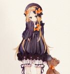  1girl abigail_williams_(fate) black_bow black_dress black_headwear blonde_hair bloomers bow commentary_request cowboy_shot dress dress_bow fate/grand_order fate_(series) hair_bow hand_up holding holding_stuffed_toy long_hair long_sleeves orange_bow pinkusan sleeves_past_fingers sleeves_past_wrists solo stuffed_animal stuffed_toy teddy_bear 
