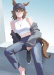  1girl absurdres animal_ears bare_shoulders baseball_cap black_headwear blue_eyes boc&#039;z_(umamusume) brown_hair closed_mouth commentary_request ears_through_headwear feet_out_of_frame grey_pants hair_between_eyes hat highres holding holding_shoes horse_ears horse_girl horse_tail jacket jacket_partially_removed long_hair midriff mr._c.b._(umamusume) mukakin official_alternate_costume pants shirt shoes shoes_removed sleeveless sleeveless_shirt smile solo sweatpants tail umamusume white_shirt 