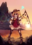  1girl absurdres adapted_costume blonde_hair commentary cowboy_hat fang fang_out flandre_scarlet hair_between_eyes hands_on_own_hips hat highres legs_apart looking_at_viewer outdoors penglai_tea pigeon-toed purple_eyes smile solo standing sunset touhou v-shaped_eyebrows 