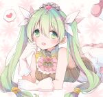  1girl :d armor ascot bare_shoulders blush breastplate breasts commentary flower frey_(rune_factory) gloves green_eyes green_hair hair_between_eyes hair_ribbon hand_on_own_cheek hand_on_own_face hand_up heart long_hair looking_at_viewer lying medium_breasts mini_mamu on_stomach open_mouth pink_flower ribbon rune_factory rune_factory_4 shirt sleeveless sleeveless_shirt smile solo spoken_heart symbol-only_commentary tiara twintails very_long_hair white_gloves white_ribbon 