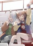  2girls absurdres alternate_costume animal_ears arm_up blue_hair blue_jacket brown_hair brown_jacket closed_eyes collared_shirt daitaku_helios_(umamusume) ear_covers feet fuyukayui green_sweater grey_pants grey_shorts highres holding holding_megaphone horse_ears horse_girl horse_tail jacket k.s.miracle_(umamusume) letterman_jacket long_hair long_sleeves megaphone multicolored_hair multiple_girls open_clothes open_jacket open_mouth pants ponytail red_sweater shirt short_hair shorts shouting sitting socks streaked_hair sweater tail teeth translation_request umamusume upper_teeth_only white_shirt white_socks 