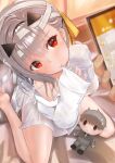  1girl absurdres bandaged_head bandages bare_legs barefoot biting biting_clothes blush breasts cellphone character_doll cleavage clothes_in_mouth collared_shirt doll dress_shirt from_above goddess_of_victory:_nikke grey_hair hair_between_eyes hair_ribbon hawatari2019 highres holding holding_doll long_hair modernia_(first_affection)_(nikke) modernia_(nikke) no_bra off_shoulder official_alternate_costume phone pout red_eyes ribbon shirt single_hair_intake sitting smartphone tearing_up white_shirt wing_collar yellow_ribbon 