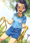  1girl bangs_pinned_back black_hair blue_shirt blue_shorts breasts brown_eyes falling_leaves female_child happy highres lamppost leaf open_mouth original pairan shirt shorts slide small_breasts smile solo standing tree_shade 