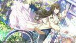  1girl ahoge bicycle braid brown_eyes brown_hair coat commentary_request day dutch_angle highres idolmaster idolmaster_shiny_colors kuwayama_chiyuki long_hair long_skirt long_sleeves looking_at_viewer official_art outdoors skirt solo waving wind 