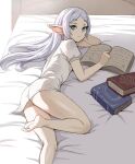  1girl ass barefoot bed book drop_earrings earrings elf frieren green_eyes grey_hair highres jewelry long_hair lying no_pants on_bed on_side open_book pointy_ears shirt solo sousou_no_frieren white_shirt zefrableu 