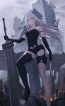  1girl absurdres bird black_gloves breasts building city closed_mouth cyborg destruction drid elbow_gloves embers fire floating_hair foot_out_of_frame gloves grey_eyes grey_sky highres long_hair mole mole_under_mouth nier:automata nier_(series) outdoors planted planted_sword rubble short_shorts shorts single_thighhigh small_breasts solo sword thighhighs torn_clothes weapon white_hair yorha_type_a_no._2 