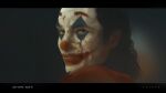  1boy 2019 arthur_fleck artist_name astraw black_border blood border clown dated facepaint highres joaquin_phoenix joker_(2019) joker_(dc) long_hair looking_at_viewer looking_to_the_side portrait red_nose smile solo suit 