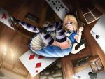  1girl absurdres abukumacl alice_(alice_in_wonderland) alice_(alice_in_wonderland)_(cosplay) alice_in_wonderland blonde_hair blue_eyes blush candle card cosplay dress falling freckles highres looking_up playing_card ribbon scared solo thighhighs zettai_ryouiki 
