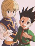  2boys :d blonde_hair clenched_hand closed_mouth cowboy_shot enoki_(gongindon) from_above gon_freecss hair_between_eyes hand_up hunter_x_hunter kurapika long_sleeves looking_at_viewer male_focus multiple_boys official_style red_eyes shirt short_hair simple_background smile spiked_hair 