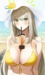  1girl absurdres bare_shoulders bikini blue_archive blush breasts bubble_tea bubble_tea_challenge cleavage collarbone cup disposable_cup drinking_straw green_eyes halo hat highres large_breasts leavv light_brown_hair long_hair looking_at_viewer navel nonomi_(blue_archive) nonomi_(swimsuit)_(blue_archive) object_on_breast official_alternate_costume revision solo sun_hat swimsuit white_headwear yellow_bikini 