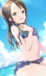  1girl bare_shoulders bikini black_hair blue_bikini blue_eyes blue_sky blurry blurry_background blush bow breasts cloud collarbone day dot_nose earrings floral_print frilled_bikini frills hair_bow hand_up highres hoop_earrings idolmaster idolmaster_shiny_colors jewelry lens_flare long_hair looking_at_viewer mitsumine_yuika navel no_eyewear ocean open_mouth outdoors pachiko print_bikini sitting sky small_breasts smile solo sunlight swimsuit twintails wariza wet yellow_bow 