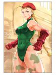  1girl abs ahoge beret blonde_hair blue_eyes bodypaint braid breasts cammy_white commentary_request covered_navel cowboy_shot fingerless_gloves gloves green_leotard hat highleg highleg_leotard highres huge_ahoge leotard long_hair looking_at_viewer medium_breasts red_gloves red_headwear scar scar_on_cheek scar_on_face solo standing street_fighter turtleneck_leotard tuzi717 twin_braids 