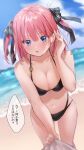  1girl bare_shoulders beach bikini black_bikini black_ribbon blue_eyes blurry blurry_background blush breasts chigusa_minori cleavage clothes_pull collarbone commentary cowboy_shot day go-toubun_no_hanayome hair_behind_ear hair_ribbon hair_tucking halterneck highres looking_at_viewer medium_breasts medium_hair nakano_nino navel open_mouth outdoors pink_hair ribbon shadow solo sparkle stomach sweatdrop swimsuit translation_request two_side_up 
