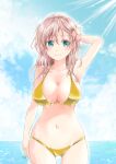  1girl bikini blue_sky breasts cleavage cloud commentary_request day gold_bikini green_eyes hands_on_own_head highres horizon large_breasts light_brown_hair light_rays looking_at_viewer matsuura@parao ocean original outdoors sky solo standing sunbeam sunlight swimsuit 