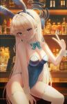  1girl alcohol animal_ears bar_(place) bare_shoulders blonde_hair blue_archive blue_bow blue_eyes blue_hairband blue_leotard bottle bow bowtie braid breasts detached_collar ear_piercing earpiece fake_animal_ears glint hairband halo highleg highleg_leotard highres io_388117 leotard long_hair medium_breasts microphone official_alternate_costume official_alternate_hairstyle parted_lips piercing playboy_bunny rabbit_ears sitting solo stool thighhighs thighs toki_(blue_archive) toki_(bunny)_(blue_archive) v very_long_hair white_thighhighs wrist_cuffs 