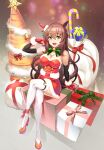  1girl alternate_costume bare_shoulders bell bow bowtie box breasts brown_hair candy candy_cane christmas christmas_tree cleavage crossed_legs detached_sleeves dress ear_covers food full_body gift gift_box gloves green_eyes hairband high_heels highres long_hair looking_at_viewer maruzensky_(umamusume) neck_bell open_mouth red_dress red_footwear red_gloves sack santa_costume single_ear_cover sitting smile solo strapless strapless_dress takase_hiro thighhighs umamusume white_thighhighs 