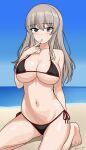  1girl arm_behind_back beach bikini black_bikini blue_eyes blush breasts cleavage finger_to_mouth girls_und_panzer grey_hair highres itsumi_erika kneeling kotorigaka large_breasts long_hair looking_at_viewer micro_bikini navel outdoors side-tie_bikini_bottom solo stomach swimsuit twitter_username 