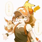  1girl :d backpack bag brown_eyes brown_hair clothed_pokemon commentary copyright_name eevee elaine_(pokemon) hat long_hair looking_at_viewer majyo_(witch_poke) on_head open_mouth pikachu pokemon pokemon_(creature) pokemon_(game) pokemon_lgpe pokemon_on_head shirt short_sleeves smile speech_bubble symbol-only_commentary translation_request white_background white_headwear white_shirt wristband 