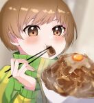  1girl blurry blurry_background blush bowl brown_eyes brown_hair chopsticks commentary_request depth_of_field eating eyelashes food food_on_face fried_egg green_jacket gyuudon hand_up highres holding jacket multicolored_clothes multicolored_jacket persona persona_4 satonaka_chie short_hair solo steam swept_bangs teeth track_jacket two-tone_jacket upper_teeth_only yellow_jacket yuyuy_00 