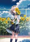  1girl blue_skirt blue_sky chain-link_fence cloud cloudy_sky commentary_request day fence flower grey_hair hairband hanekoto highres holding holding_flower looking_at_viewer original outdoors pleated_skirt sailor_collar school_uniform serafuku skirt sky solo standing sunflower twitter_username yellow_eyes 