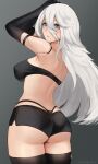  1girl a2_(nier:automata) arm_strap ass bandeau bare_shoulders black_gloves black_shorts black_thighhighs breasts commentary cowboy_shot elbow_gloves from_behind gloves grey_background grey_eyes hair_between_eyes highres hioyami large_breasts long_hair midriff mole mole_under_mouth nier:automata nier_(series) parted_lips pink_lips short_shorts shorts solo standing strapless thighhighs thighs tube_top very_long_hair white_hair 