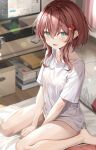  1girl absurdres bare_legs bed blue_eyes blurry blurry_background blush breasts cellphone collarbone commentary_request computer desk hair_between_eyes hair_ornament highres medium_breasts open_mouth original phone pillow rumiko_(rmeco) shirt short_hair_with_long_locks sitting solo 