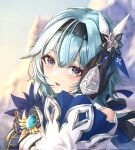  1girl adjusting_hair agenoumi black_gloves black_hairband blue_cape blue_hair blurry blurry_background blush cape clothing_cutout commentary_request double-parted_bangs eula_(genshin_impact) genshin_impact gloves hair_between_eyes hair_ornament hairband hand_up highres looking_at_viewer medium_hair mountain multicolored_eyes open_mouth parted_lips portrait purple_eyes shoulder_cutout sidelocks solo sunset two-tone_gloves upper_body vision_(genshin_impact) white_sleeves wide_sleeves 
