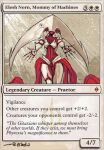  alien card elesh_norn female hasbro hoka looking_at_viewer magic:_the_gathering phyrexian red_body red_skin simple_background solo tan_background wizards_of_the_coast 