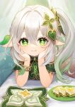  blush elf food genshin_impact green_eyes hair_ornament hands_on_own_cheeks hands_on_own_face highres hitsujino_mery looking_at_viewer lying nahida_(genshin_impact) on_stomach plate pointy_ears side_ponytail sparkle symbol-shaped_pupils white_hair 