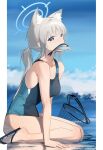  1girl animal_ear_fluff animal_ears black_footwear black_one-piece_swimsuit blue_archive blue_eyes blue_halo breasts commentary competition_swimsuit fish grey_hair halo highres legs looking_at_viewer mackerel_(fish) medium_breasts medium_hair mouth_hold ocean official_alternate_costume one-piece_swimsuit sandals shiroko_(blue_archive) shiroko_(swimsuit)_(blue_archive) sitting solo swimsuit thighs yuan_(ziranran) 
