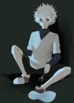  1boy blue_eyes candy food full_body highres holding holding_candy holding_food holding_lollipop hunter_x_hunter killua_zoldyck layered_sleeves leg_up lollipop long_sleeves looking_at_viewer male_child male_focus shirt short_hair short_over_long_sleeves short_sleeves shorts sitting solo white_hair white_shirt z_akiy 