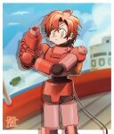  1boy absurdres arm_cannon cable cable_tail cosplay frown hand_on_own_arm highres holostars holostars_english machina_x_flayon male_focus mechanical_tail mega_man_(series) mega_man_legends mega_man_volnutt mega_man_volnutt_(cosplay) orange_eyes pktmgs red_armor red_hair signature tail weapon 