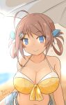  1girl ahoge beach_umbrella bikini braid breasts brown_hair chougei_(kancolle) cleavage closed_mouth commentary_request curse_(023) denim denim_shorts front-tie_bikini_top front-tie_top grey_eyes hair_rings highres kantai_collection large_breasts long_hair looking_at_viewer navel official_alternate_costume orange_bikini outdoors shorts smile solo swimsuit twin_braids umbrella upper_body 