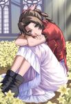  1girl aerith_gainsborough black_footwear braid braided_ponytail brown_hair closed_mouth commentary dress english_commentary final_fantasy final_fantasy_vii final_fantasy_vii_remake fingernails flower green_eyes hair_ribbon highres hugging_own_legs indoors jacket kivavis lips long_hair looking_at_viewer pink_lips pink_nails pink_ribbon pocket red_jacket ribbon shoes short_sleeves sitting smile solo white_dress yellow_flower 