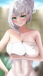  1girl absurdres alternate_hairstyle arm_support armpit_crease bare_shoulders bath bathing blush breasts cleavage closed_mouth collarbone green_eyes grey_hair hair_bun hand_on_own_chest highres hololive katagirinanoka large_breasts looking_at_viewer medium_hair naked_towel onsen rock shirogane_noel smile solo towel virtual_youtuber 