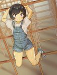  1girl 2equal8 black_hair blue_overalls brown_eyes closed_mouth day hanging_on highres medium_hair original outdoors overalls playground sawada_kanako shirt shoes short_sleeves shorts sneakers socks solo tomboy white_shirt 