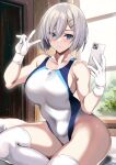  1girl alternate_costume blue_eyes breasts cellphone closed_mouth commentary_request competition_swimsuit covered_navel gloves grey_hair hair_between_eyes hair_ornament hairclip hamakaze_(kancolle) hands_up highleg highleg_swimsuit highres holding holding_phone indoors kantai_collection kyogoku_shin large_breasts looking_at_phone one-piece_swimsuit phone red_one-piece_swimsuit selfie short_hair sitting solo swimsuit thighhighs thighs two-tone_swimsuit v white_gloves white_one-piece_swimsuit white_thighhighs 