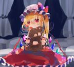  1girl blonde_hair closed_mouth curtains dark_background flandre_scarlet frilled_skirt frilled_sleeves frills hair_between_eyes hat hat_ribbon head_tilt hiyuu_(hiyualice) holding holding_stuffed_toy indoors looking_at_viewer medium_hair mob_cap multicolored_wings one_side_up pointy_ears puffy_short_sleeves puffy_sleeves red_eyes red_ribbon red_skirt red_vest ribbon shirt short_sleeves skirt sleeve_ribbon solo stuffed_animal stuffed_toy teddy_bear touhou vest white_curtains white_headwear white_shirt wings 