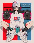  1girl aqua_shorts baseball_cap between_legs black_hair black_socks blue_background blue_eyes blunt_bangs blush boombox commentary fila grey_eyes hand_between_legs hat headphones highres jitome looking_at_viewer medium_hair nao97122 open_mouth original outside_border print_headwear print_shirt red_background ribbed_socks shirt shirt_tucked_in shoes shorts sidelocks sitting sleeves_past_elbows sneakers socks solo straight-on tamiya_incorporated two-tone_background white_footwear white_headwear white_shirt 