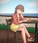  1girl alternate_costume arashio_(kancolle) blue_sky brown_eyes brown_hair chair cloud commentary crossed_legs day dress feet_out_of_frame highres horizon jacket kantai_collection konato_k long_hair ocean one_eye_closed outdoors pink_jacket railing sandals sky smile solo table yellow_dress 