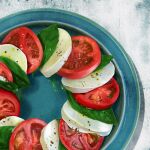  basil_leaf caprese_salad cheese food food_focus leaf no_humans original plate pnt_s salad shadow still_life tomato tomato_slice 