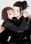  1boy 1girl ateka black_eyes black_hair black_jacket brown_eyes brown_hair couple ear_piercing getou_suguru hair_bun hair_pulled_back hetero highres hug ieiri_shoko jacket jujutsu_kaisen jujutsu_tech_uniform kiss kissing_cheek long_sleeves mole mole_under_eye one_eye_closed piercing school_uniform short_hair simple_background upper_body white_background 