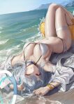  1girl arm_strap arms_up bikini blue_archive breasts grin halo highres leviathan_(hikinito0902) long_hair looking_at_viewer lying medium_breasts navel noa_(blue_archive) ocean one_eye_closed purple_eyes shirt smile solo string_bikini swimsuit thigh_strap very_long_hair white_bikini white_hair white_halo white_shirt yellow_innertube 