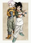  2boys back-to-back baggy_pants black_eyes black_hair blue_eyes boots commentary_request dragon_ball dragon_ball_z furrowed_brow grin hands_in_pockets highres kakeru_(dbskakeru) male_focus multiple_boys pants pink_hair shirt shoes smile sneakers son_gohan son_goten t-shirt vest wristband yellow_vest 